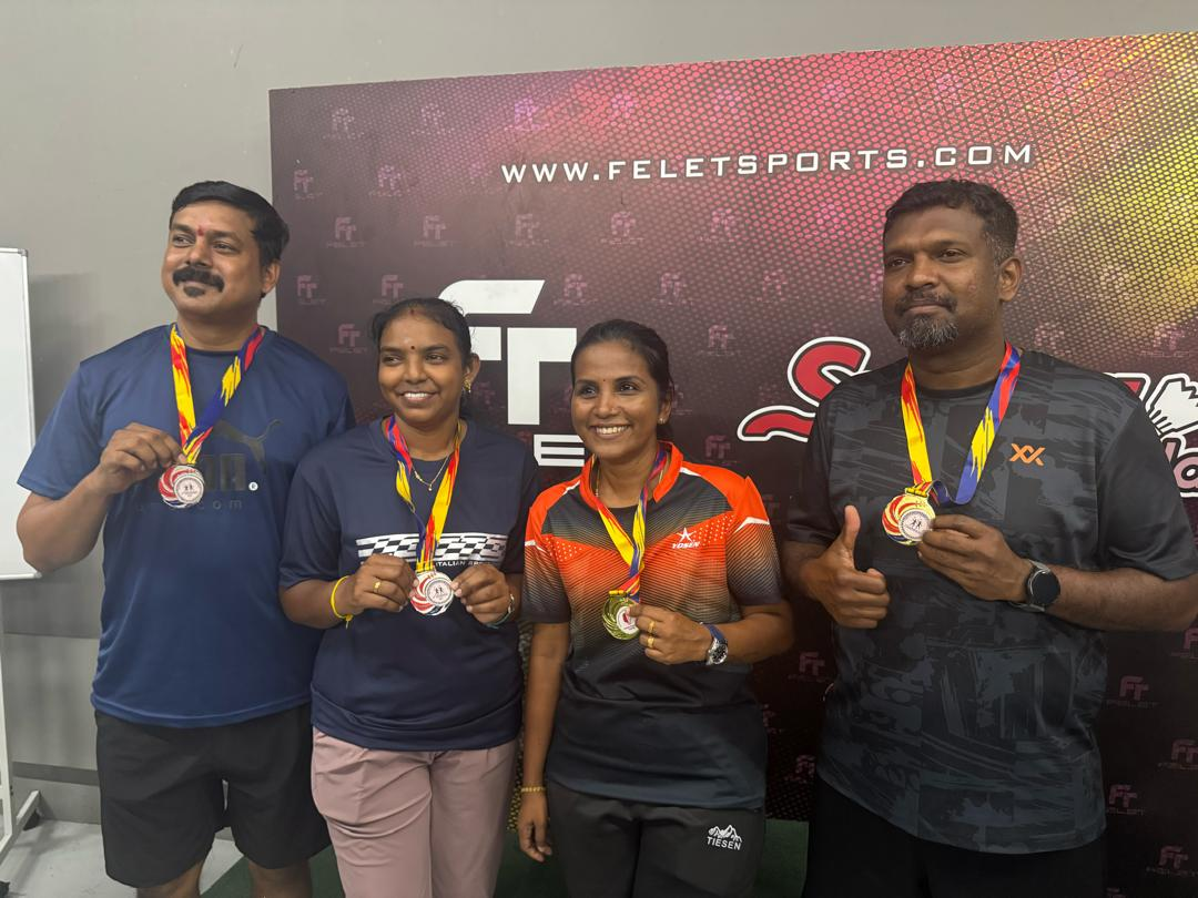 Parents with active participation certificates at the badminton tournament