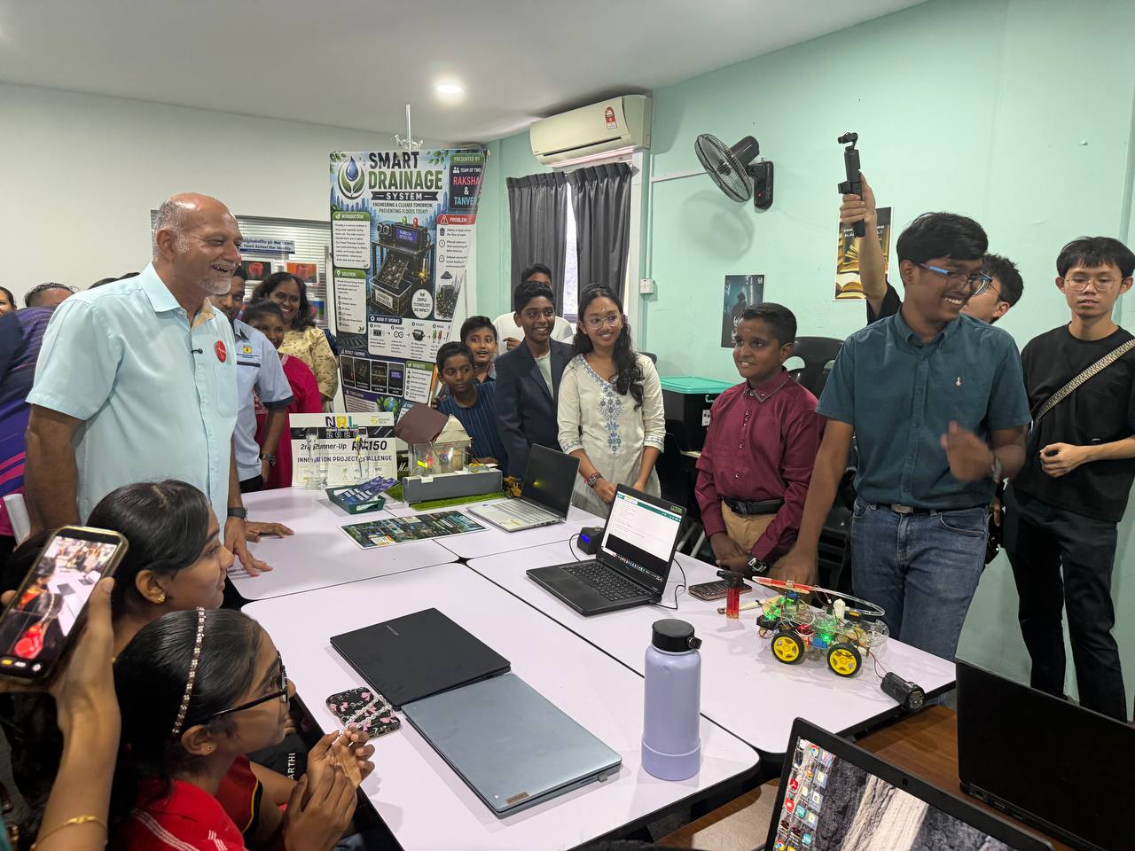Students showcasing their projects to Malaysia's Minister of Digital, 2026