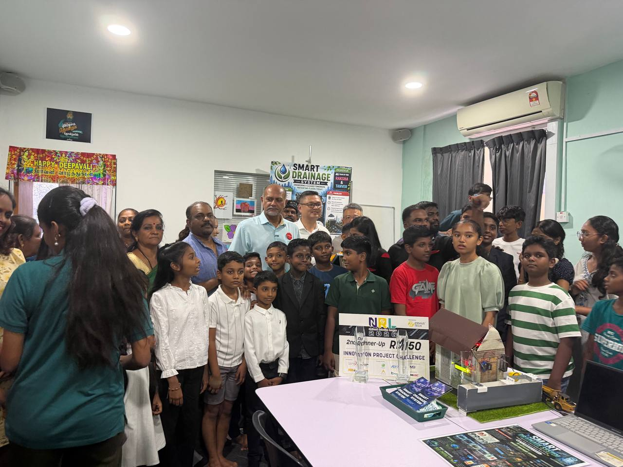 Students showcasing their projects to Malaysia's Minister of Digital, 2026