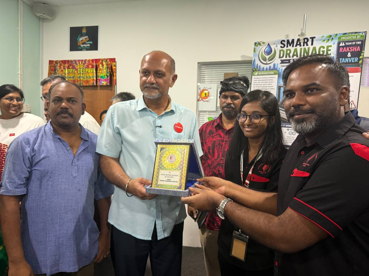 Students showcasing their projects to Malaysia's Minister of Digital, 2026